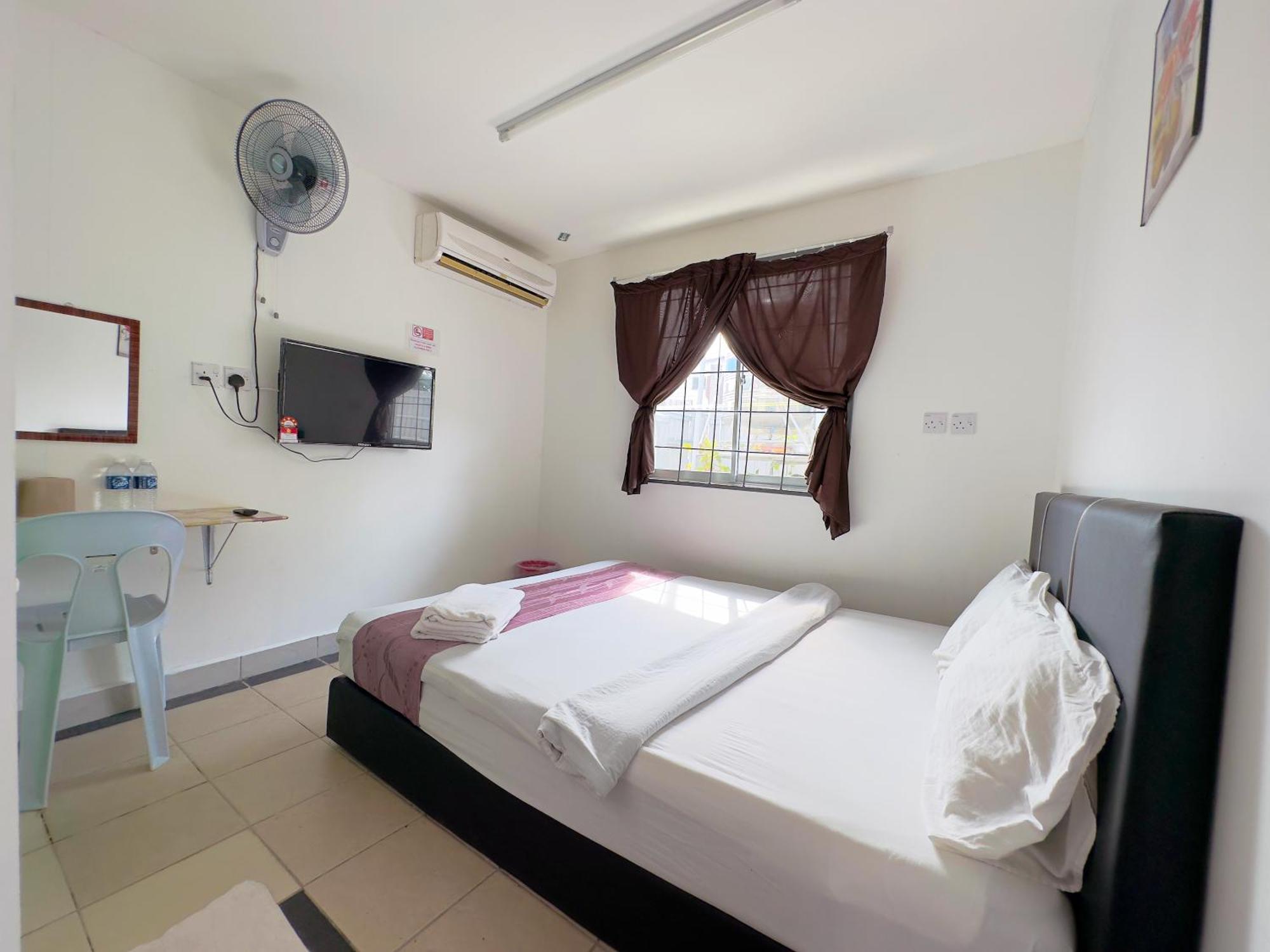 Borneo Inn Кота-Кинабалу Номер фото