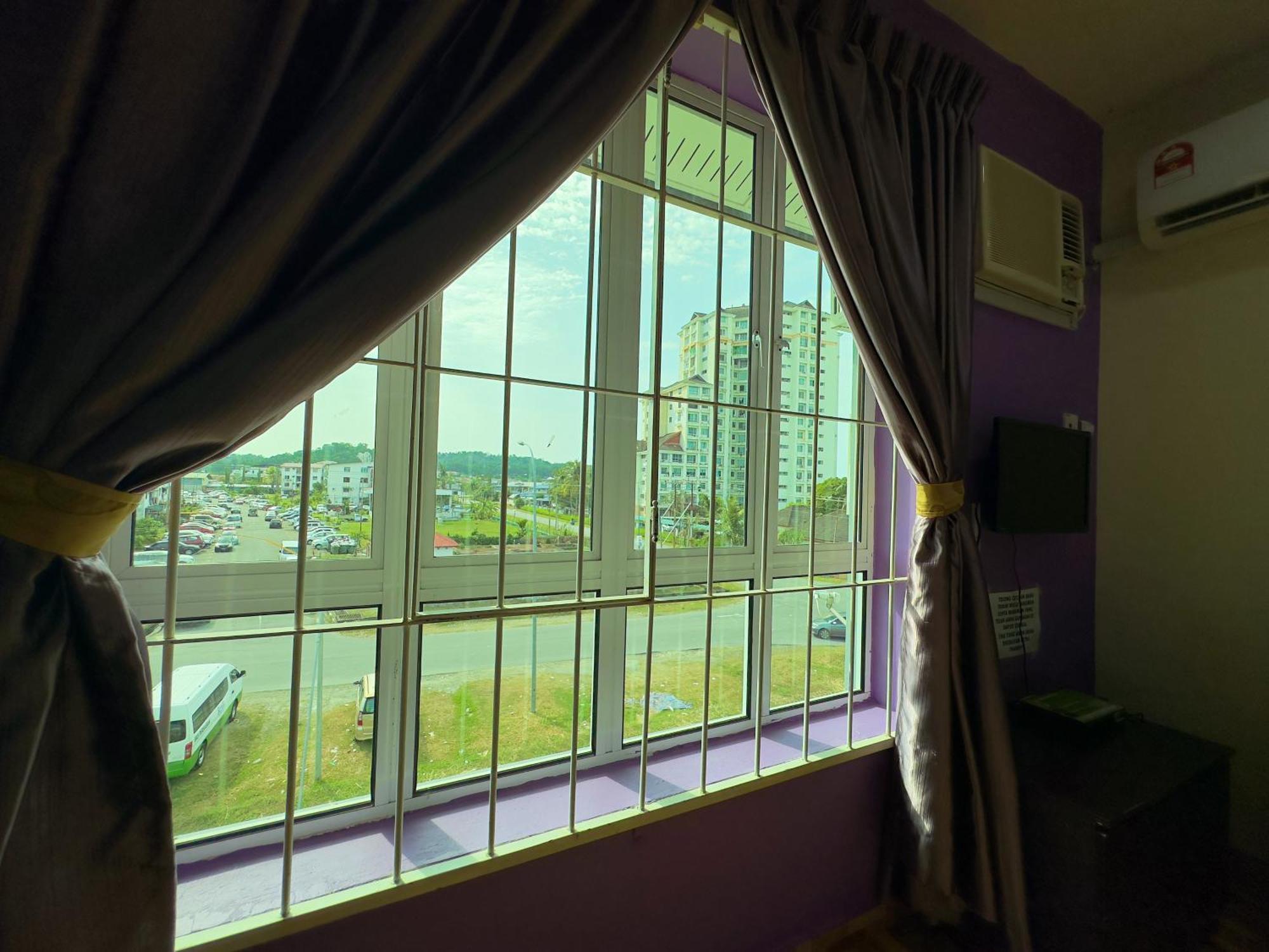 Borneo Inn Кота-Кинабалу Номер фото