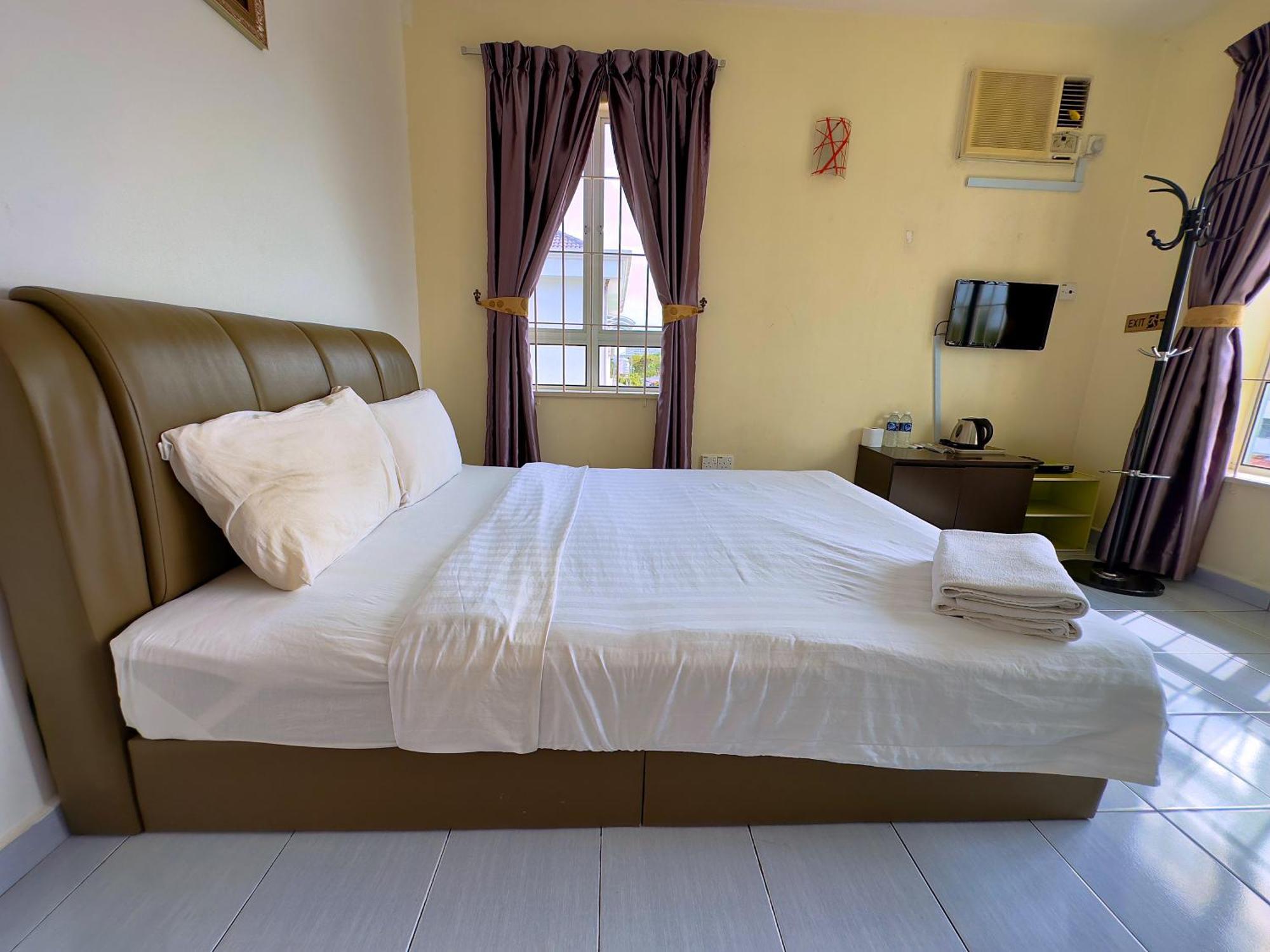 Borneo Inn Кота-Кинабалу Номер фото